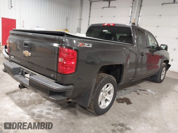 2016 Chevrolet Silverado 1500 LT with VIN 1GCVKREC0GZ303387, listed as a IAAI auction lot 41978237 with 123,692 mi miles and . Bid and sale history available at DreamBid. Image 4.