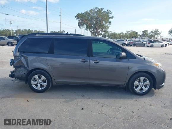 2014 Toyota Sienna LE AAS with VIN 5TDKK3DCXES432611, listed as a IAAI auction lot 40771635 with 214,145 mi miles and . Bid and sale history available at carsss.com. Image 14.