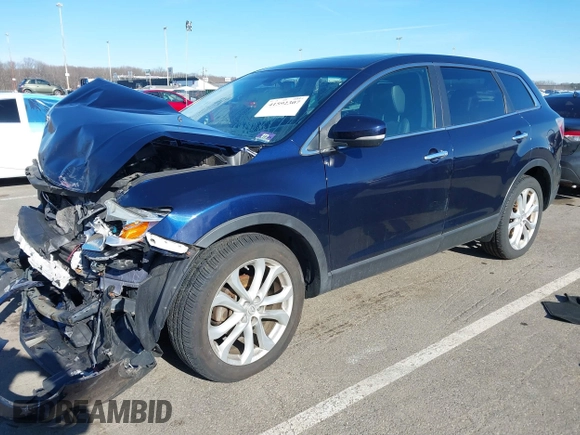 2012 Mazda CX-9 Grand Touring with VIN JM3TB3DV2C0338235, listed as a IAAI auction lot 41592307 with 1 mi miles. Bid and sale history available at carsss.com. Image 2.