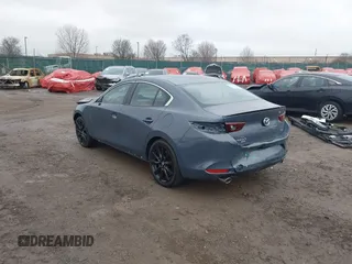 2025 Mazda 3 S Carbon Edition with VIN JM1BPBCM4S1760993, listed as a IAAI auction lot 41446098 with 102 mi miles and . Bid and sale history available at DreamBid. Image 3.