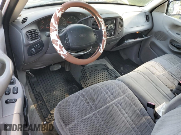 1998 Ford F-150 z VIN 1FTZX18W2WNC09396, wystawiony jako Copart lot #60355505 z przebiegiem 221 565 mil mil oraz Czysty tytuł • Clean title. Historia ofert i sprzedaży dostępna na DreamBid. Obrazek 8.