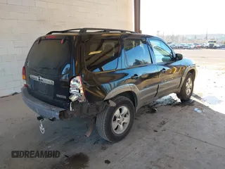 2002 Mazda Tribute LX with VIN 4F2CU08172KM58561, listed as a IAAI auction lot 41435407 with 141,908 mi miles and . Bid and sale history available at carsss.com. Image 4.
