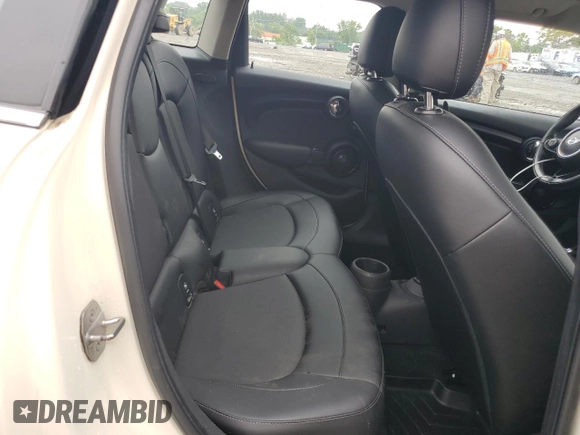 2017 MINI Hardtop 4 Door Cooper with VIN WMWXU1C53H2E18584, listed as a Copart auction lot 61355915 with 56,171 mi miles and Salvage title. Bid and sale history available at DreamBid. Image 10.