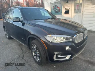 2018 BMW X5 xDrive35i with VIN 5UXKR0C57J0X83615, listed as a Copart auction lot 83307484 with 174,911 mi miles and Clean Title. Bid and sale history available at carsss.com. Image 4.