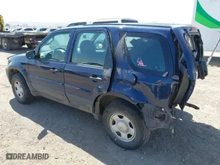 2003 Ford Escape XLS Popular with VIN 1FMYU92143KB89726, listed as a IAAI auction lot 42002613 with 95,586 mi miles. Bid and sale history available at carsss.com. Image 3.