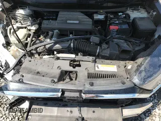 2020 Honda CR-V EX с VIN 2HKRW1H52LH400399, выставлен на аукционе Copart как лот 71477265 с пробегом 71 227 миль миль и Списание • Salvage title. История ставок и продаж доступна на DreamBid. Изображение 16.