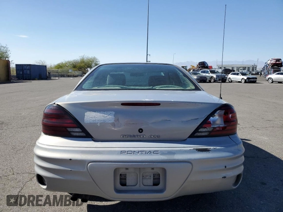 1999 Pontiac Grand Am SE2 with VIN 1G2NE52E5XM826878, listed as a Copart auction lot 77351164 with 241,463 mi miles and Salvage Title. Bid and sale history available at carsss.com. Image 6.