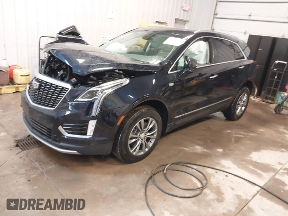 2021 Cadillac XT5 AWD Premium Luxury with VIN 1GYKNDR41MZ156521, listed as a IAAI auction lot 41554791 with 30,871 mi miles and . Bid and sale history available at DreamBid. Image 18.