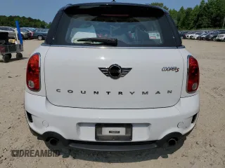 2014 MINI Countryman S with VIN WMWZC5C5XEWP37128, listed as a Copart auction lot 59549885 with 84,121 mi miles and Salvage title. Bid and sale history available at DreamBid. Image 6.