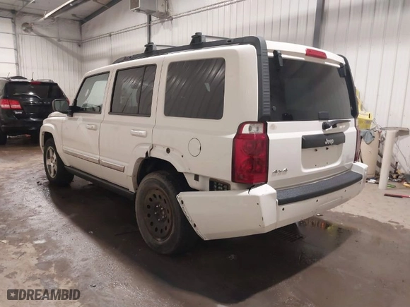 2010 Jeep Commander Sport with VIN 1J4RG4GK7AC132121, listed as a IAAI auction lot 41187854 with 155,413 mi miles. Bid and sale history available at carsss.com. Image 3.