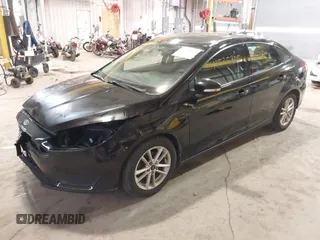 2017 Ford Focus SE with VIN 1FADP3F22HL292063, listed as a IAAI auction lot 41525805 with 104,760 mi miles and . Bid and sale history available at DreamBid. Image 2.