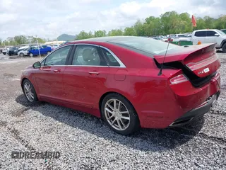 2014 Lincoln MKZ z VIN 3LN6L2G97ER811198, wystawiony jako IAAI lot #42132804 z przebiegiem 108 720 mil mil oraz . Historia ofert i sprzedaży dostępna na DreamBid. Obrazek 3.