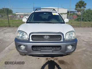 2004 Hyundai Santa Fe GLS with VIN KM8SC73D74U675555, listed as a IAAI auction lot 42021978 with 198,778 mi miles. Bid and sale history available at carsss.com. Image 6.