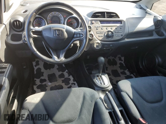 2009 Honda Fit Sport с VIN JHMGE88459S048194, выставлен на аукционе Copart как лот 52581055 с пробегом 177 290 миль миль и Списание • Salvage title. История ставок и продаж доступна на DreamBid. Изображение 8.