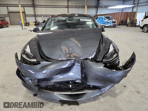 2023 Tesla Model 3 with VIN 5YJ3E1EA4PF554840, listed as a Copart auction lot 63731175 with Not provided miles and Salvage title. Bid and sale history available at DreamBid. Image 5.