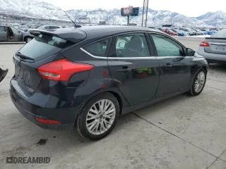 2015 Ford Focus Titanium with VIN 1FADP3N28FL234988, listed as a Copart auction lot 45776425 with 72,307 mi miles and Salvage Title. Bid and sale history available at carsss.com. Image 3.