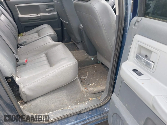 2005 Dodge Dakota Laramie with VIN 1D7HW58NX5S227633, listed as a IAAI auction lot 42122619 with 85,338 mi miles and . Bid and sale history available at DreamBid. Image 8.