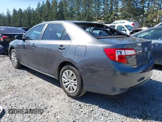 2014 Toyota Camry L with VIN 4T4BF1FK9ER423232, listed as a IAAI auction lot 41980213 with 157,132 mi miles. Bid and sale history available at carsss.com. Image 3.