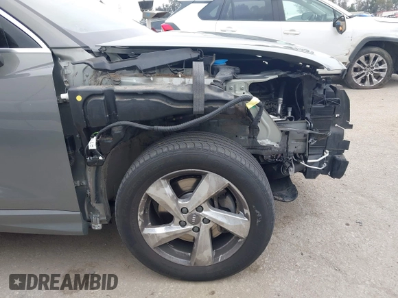 2020 Audi Q3 Premium with VIN WA1AECF32L1061271, listed as a IAAI auction lot 42038795 with 23,902 mi miles and . Bid and sale history available at DreamBid. Image 20.