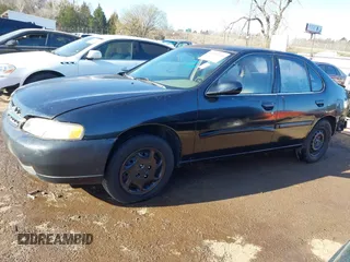 1999 Nissan Altima XE with VIN 1N4DL01D2XC156582, listed as a IAAI auction lot 41783168 with 292,251 mi miles. Bid and sale history available at carsss.com. Image 14.