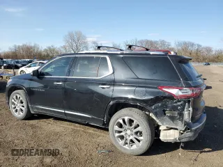 2018 Chevrolet Traverse Premier with VIN 1GNEVJKW5JJ152423, listed as a Copart auction lot 51202685 with 124,673 mi miles and Salvage Title. Bid and sale history available at DreamBid. Image 2.