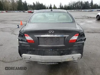 2012 Infiniti M z VIN JN1BY1AP8CM334084, wystawiony jako Copart lot #50758815 z przebiegiem 107 917 mil mil oraz Szkody całkowita. Historia ofert i sprzedaży dostępna na DreamBid. Obrazek 6.