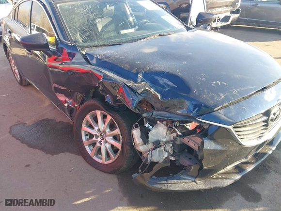 2016 Mazda Mazda6 i Sport with VIN JM1GJ1U54G1403118, listed as a IAAI auction lot 41330515 with 106,788 mi miles. Bid and sale history available at carsss.com. Image 6.