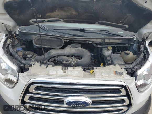 2019 Ford Transit z VIN 1FTYE2CM9KKA16350, wystawiony jako Copart lot #57127495 z przebiegiem 308 480 mil mil oraz Czysty tytuł • Clean title. Historia ofert i sprzedaży dostępna na DreamBid. Obrazek 11.