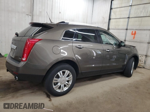 2014 Cadillac SRX Luxury Collection z VIN 3GYFNEE34ES652268, wystawiony jako Copart lot #54136545 z przebiegiem 99 542 mil mil oraz Szkoda całkowita • Salvage title. Historia ofert i sprzedaży dostępna na DreamBid. Obrazek 3.