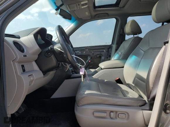 2012 Honda Pilot EX-L with VIN 5FNYF3H68CB034298, listed as a Copart auction lot 53504215 with 160,352 mi miles and Salvage title. Bid and sale history available at DreamBid. Image 7.