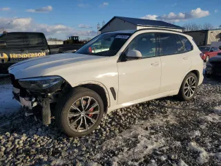 2021 BMW X5 M50i with VIN 5UXJU4C03M9E80842, listed as a Copart auction lot 42736845 with 75,390 mi miles and Salvage Title. Bid and sale history available at carsss.com. Image 1.