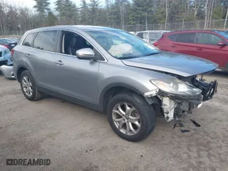 2015 Mazda CX-9 Touring with VIN JM3TB3CV1F0457951, listed as a IAAI auction lot 41845385 with NaN miles. Bid and sale history available at carsss.com. Image 1.