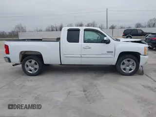 2010 Chevrolet Silverado 1500 LT with VIN 1GCSCSE00AZ293058, listed as a IAAI auction lot 41464133 with 164,865 mi miles and . Bid and sale history available at DreamBid. Image 13.