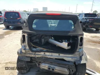 2009 Smart fortwo Passion z VIN WMEEK31X59K222243, wystawiony jako Copart lot #57106435 z przebiegiem 58 556 mil mil oraz Szkody całkowita. Historia ofert i sprzedaży dostępna na DreamBid. Obrazek 6.