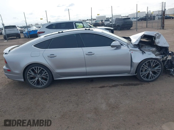 2016 Audi A7 Prestige z VIN WAU2GAFC4GN040099, wystawiony jako IAAI lot #41844495 z przebiegiem 76 133 mil mil oraz . Historia ofert i sprzedaży dostępna na DreamBid. Obrazek 13.