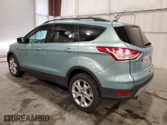 2013 Ford Escape SEL with VIN 1FMCU9H93DUA72099, listed as a Copart auction lot 58691955 with 30,449 mi miles and Salvage title. Bid and sale history available at DreamBid. Image 2.