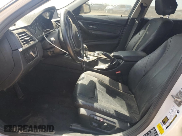 2013 BMW 3 Series 328i xDrive with VIN WBA3B3C51DF532714, listed as a Copart auction lot 57854735 with 140,650 mi miles and Salvage title. Bid and sale history available at DreamBid. Image 7.