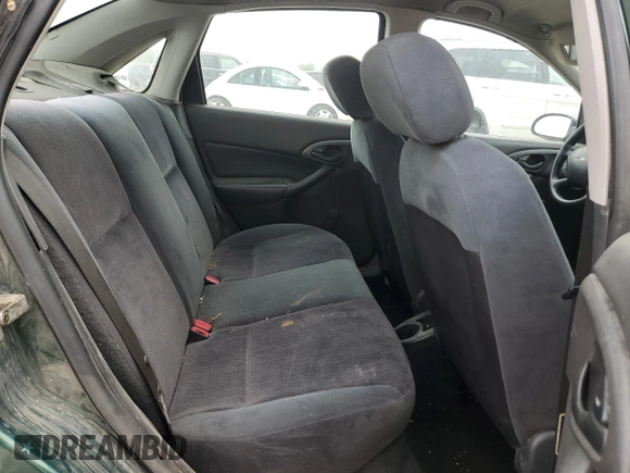 2000 Ford Focus SE z VIN 1FAFP3438YW379761, wystawiony jako Copart lot #58156125 z przebiegiem 103 816 mil mil oraz Szkoda całkowita • Salvage title. Historia ofert i sprzedaży dostępna na DreamBid. Obrazek 10.