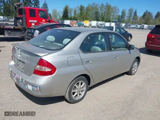 2003 Toyota Prius with VIN JT2BK18U630086718, listed as a IAAI auction lot 42036644 with 251,852 mi miles. Bid and sale history available at carsss.com. Image 4.