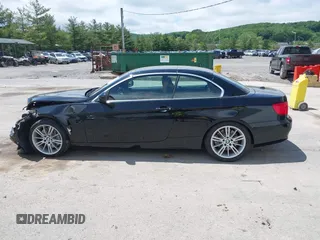 2011 BMW 3 Series 335i with VIN WBADX7C56BE579057, listed as a IAAI auction lot 42295405 with 107,160 mi miles and . Bid and sale history available at DreamBid. Image 14.