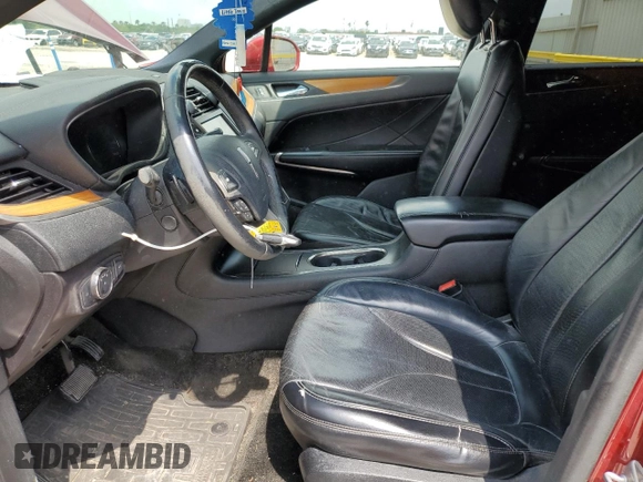 2016 Lincoln MKC Reserve with VIN 5LMCJ3C91GUJ12954, listed as a Copart auction lot 53875675 with 84,590 mi miles and Salvage title. Bid and sale history available at DreamBid. Image 7.