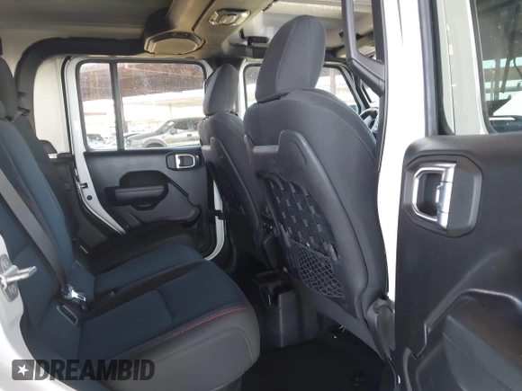 2022 Jeep Gladiator Rubicon with VIN 1C6JJTBM6NL145009, listed as a IAAI auction lot 42134143 with 59,438 mi miles and . Bid and sale history available at DreamBid. Image 8.