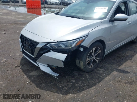 2021 Nissan Sentra SV z VIN 3N1AB8CV5MY299245, wystawiony jako IAAI lot #42180004 z przebiegiem 25 856 mil mil oraz . Historia ofert i sprzedaży dostępna na DreamBid. Obrazek 6.