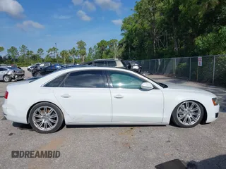 2014 Audi A8 4.0T with VIN WAUR2AFD8EN004371, listed as a IAAI auction lot 42693492 with 159,405 mi miles and . Bid and sale history available at DreamBid. Image 13.