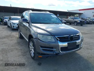 2010 Volkswagen Touareg VR6 with VIN WVGBF7A96AD002466, listed as a IAAI auction lot 41709052 with 204,819 mi miles and . Bid and sale history available at DreamBid. Image 6.