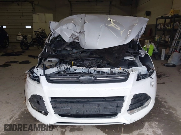 2013 Ford Escape SE with VIN 1FMCU9GX8DUC68815, listed as a IAAI auction lot 42028850 with 83,297 mi miles and . Bid and sale history available at DreamBid. Image 12.