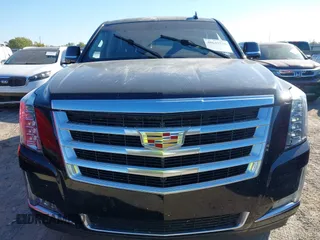 2015 Cadillac Escalade Luxury z VIN 1GYS4MKJ7FR661209, wystawiony jako IAAI lot #40645720 z przebiegiem Nie podano mil oraz . Historia ofert i sprzedaży dostępna na DreamBid. Obrazek 12.