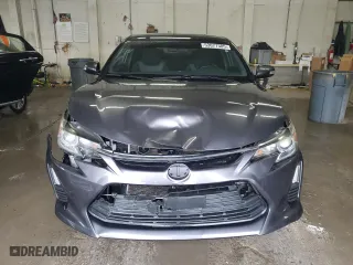 2015 Scion tC with VIN JTKJF5C70FJ002254, listed as a Copart auction lot 53077385 with 117,221 mi miles and Salvage Title. Bid and sale history available at carsss.com. Image 5.