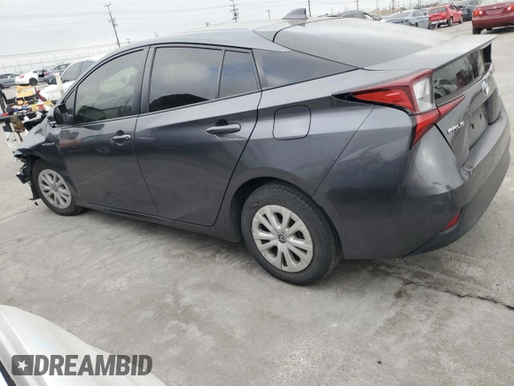 2021 Toyota Prius L Eco with VIN JTDKAMFU8M3130779, listed as a Copart auction lot 56452395 with 86,094 mi miles and Salvage title. Bid and sale history available at DreamBid. Image 2.