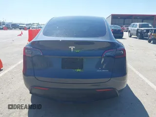 2023 Tesla Model Y Long Range with VIN 7SAYGDEE4PA037218, listed as a IAAI auction lot 42232704 with 18,756 mi miles and . Bid and sale history available at DreamBid. Image 17.